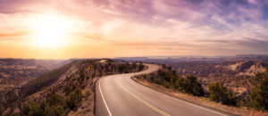 Road extending into the sunset.